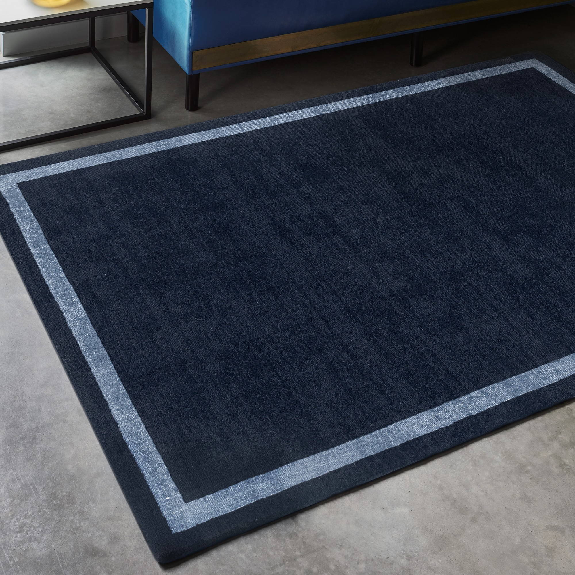 Albi Border Plain Classic Wool Rugs In Navy Blue