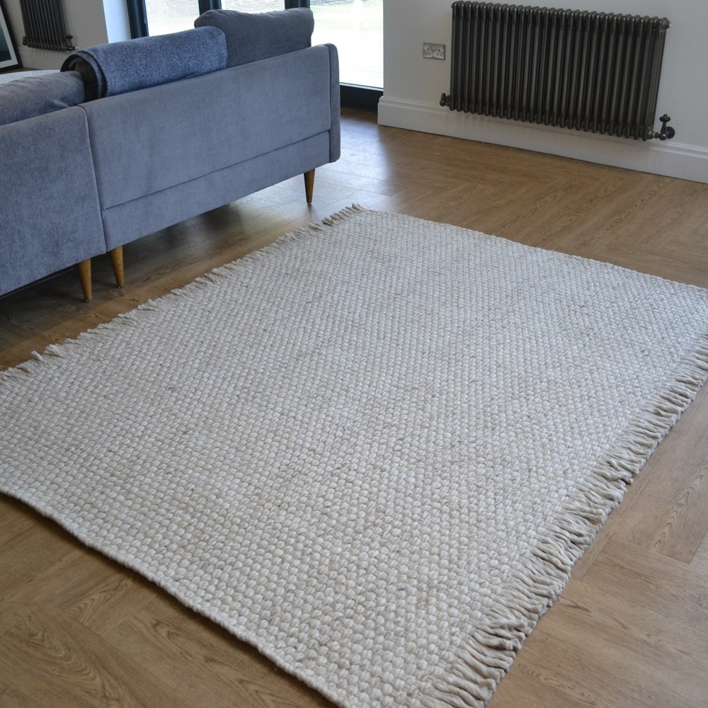 Bergen Plain Tassel Wool Rugs in Natural