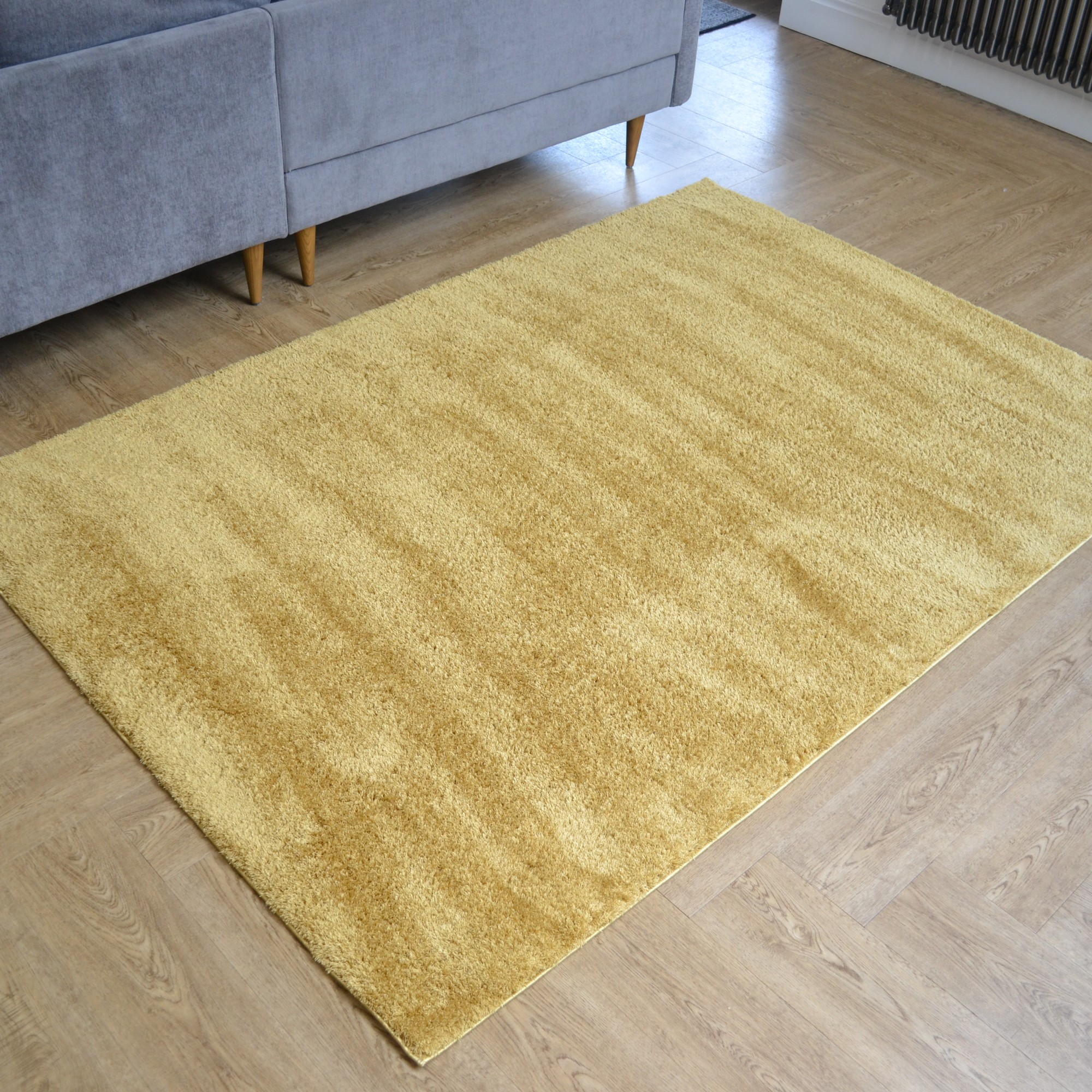 Goldy Shaggy Plain Modern Rugs In Gold Yellow