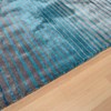 Turquoise and brown rug