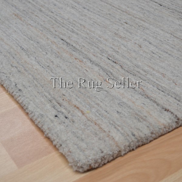 Plain Abrash Wool Rugs in Ivory buy online from the rug seller uk