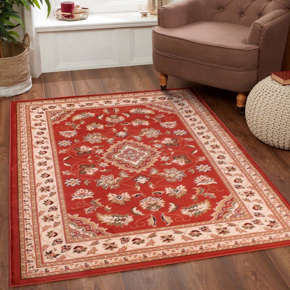 Sherborne Traditional Bordered Rugs in Terracotta Orange