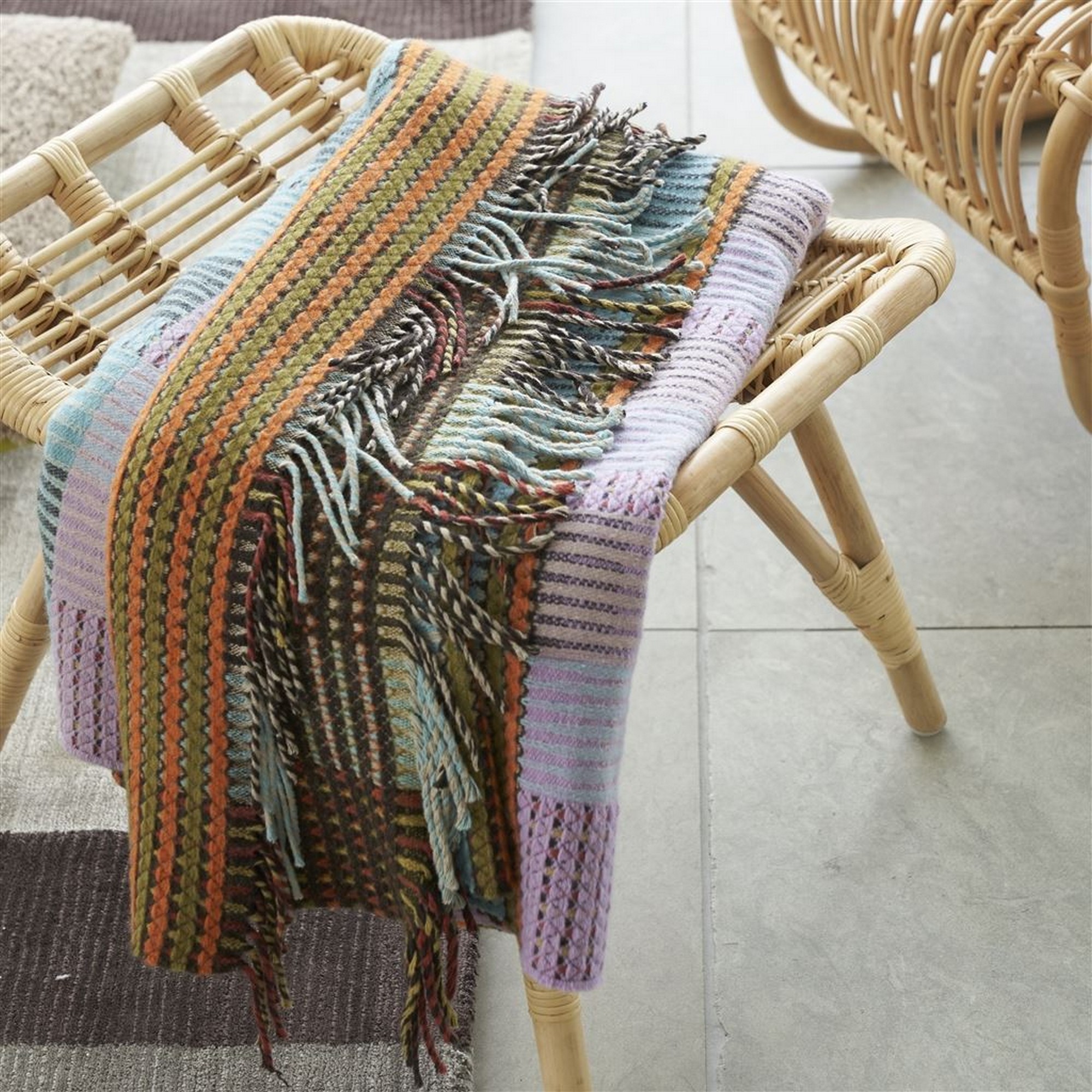 Tasara Ochre Woven Throw in Brown by Designers Guild buy online from ...